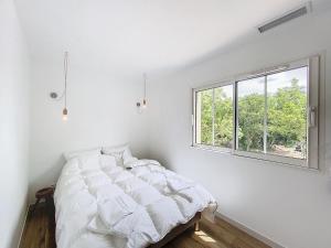 En eller flere senge i et værelse på Villa La Destenda + 32 billeder