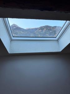 Nespecifikovaný výhled na hory nebo výhled na hory při pohledu z apartmánu