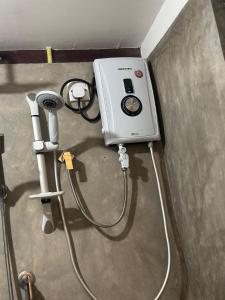 a room with a hair dryer and a hair dryer at Venora Hiriketiya in Dickwella