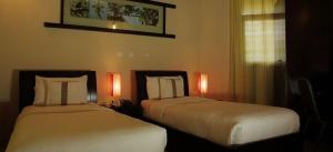 Una cama o camas en una habitación de Shimela Lodge