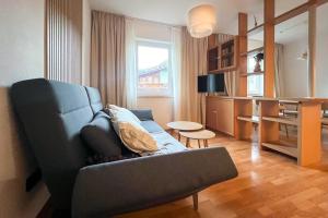 Телевизор и/или развлекательный центр в Brunnalm Blick Apartment