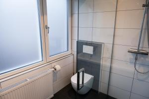 Ванная комната в Klein Witje +16 фотографий