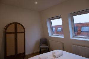 Кровать или кровати в номере Klein Witje