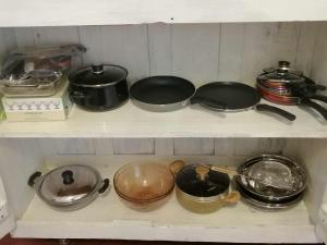 a shelf filled with pans and pots and pans at Apartment no17 in Galle +3 photos
