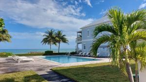Πισίνα στο ή κοντά στο Bahamas Dream - Beach Luxury Vacation