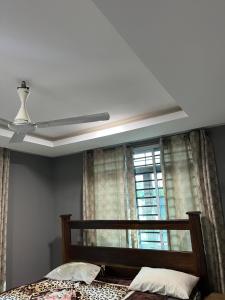 Postel nebo postele na pokoji v ubytování Ankyease Aclove