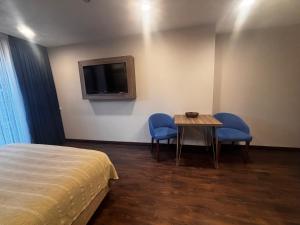 Et tv og/eller underholdning på La Quinta Batumi - Sea & Airport View