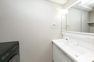 Koupelna v ubytování Living like hotel Hakata Premium + 39 fotografií