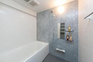 Vannituba majutusasutuses Living like hotel Hakata Premium