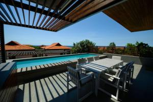 Swimmingpoolen hos eller tæt på 2 Ocean's Edge Zimbali