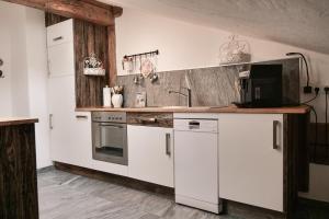 Kuchyň nebo kuchyňský kout v ubytování Rossweid Appartement + 18 fotografií