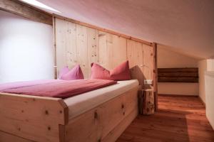 Postel nebo postele na pokoji v ubytování Rossweid Appartement