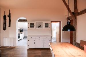 Kuchyň nebo kuchyňský kout v ubytování Rossweid Appartement