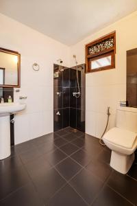 Un baño de Uyanawatta villa talpe