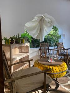 Χώρος καθιστικού στο Nyumba ya Mumbi