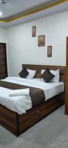 Postel nebo postele na pokoji v ubytování Hotel Casa Premier + 25 fotografií