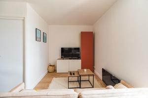 Μια τηλεόραση ή/και κέντρο ψυχαγωγίας στο Evasion Paimpol appartement neuf et confortable +11 φωτογραφίες