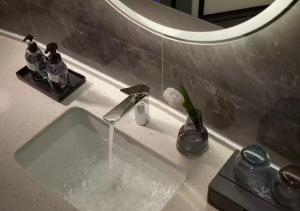 Un baño de Huanman Hotel