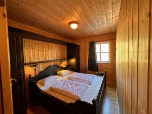 Postel nebo postele na pokoji v ubytování Beitotind 1504 + 11 fotografií