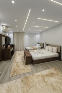 Postel nebo postele na pokoji v ubytování Kayan Pyramids View