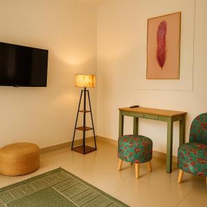 TV a/nebo společenská místnost v ubytování Hotel Amore Mio Morjim