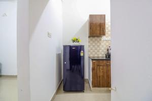 Η κουζίνα ή μικρή κουζίνα στο DivBnB homes Whitefield - 1 BHK & 2BHK Near ITPL & Manipal,Vydehi