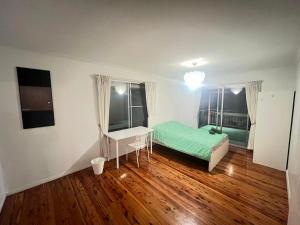 Ένα ή περισσότερα κρεβάτια σε δωμάτιο στο Room 82