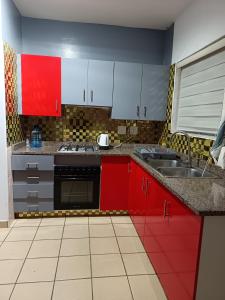 Køkken eller tekøkken på Queens Gardens