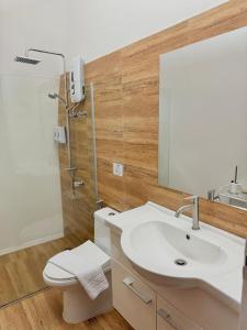 Un baño de ROYAL SUITES - PORT BARTON