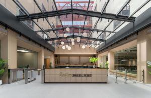 Ο χώρος του λόμπι ή της ρεσεψιόν στο OriLive Youth Hotel Dongguan Guomao