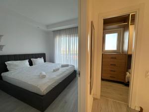 En eller flere senge i et værelse på Terra Villa #garden