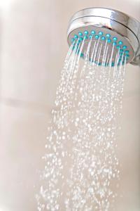 a shower head filled with lots of water at Hotel 81 Balestier in Singapore +15 photos