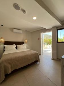 Ένα ή περισσότερα κρεβάτια σε δωμάτιο στο מלון המושבה כפר תבור