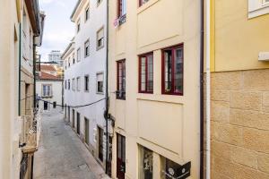 an alley between two buildings in a city at Two 2 Two Urban Stay in Vila Real