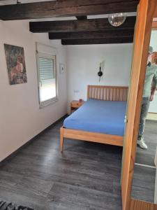 Postel nebo postele na pokoji v ubytování Rebenhaus St Martin