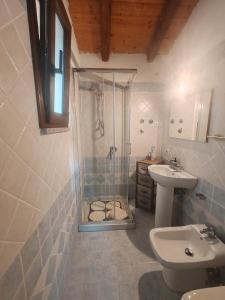 Koupelna v ubytování Smeralda Pic House