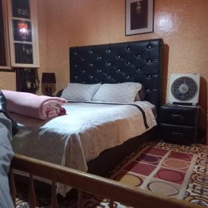 Postel nebo postele na pokoji v ubytování Tisra appartement