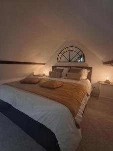 Ένα ή περισσότερα κρεβάτια σε δωμάτιο στο Gîte classé 3 étoiles - Morlaix