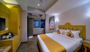 Ένα ή περισσότερα κρεβάτια σε δωμάτιο στο Foxoso Vega, Colva, Goa +4 φωτογραφίες