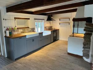 Kuchyň nebo kuchyňský kout v ubytování Jularpscity