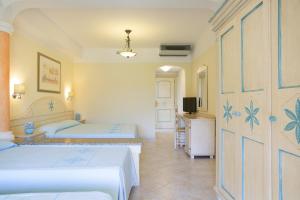 Una cama o camas en una habitación de Sentido Orosei Beach 33 fotos más