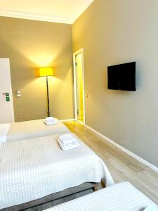 Μια τηλεόραση ή/και κέντρο ψυχαγωγίας στο Hotel Hermes T