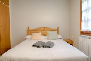 Postel nebo postele na pokoji v ubytování Saplan Real Estate SALARDÚ