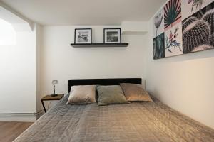 Una cama o camas en una habitación de Appartementen Purmerend B