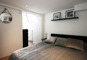 Una cama o camas en una habitación de Appartementen Purmerend B