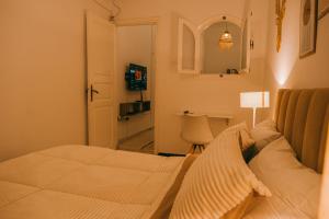 Voodi või voodid majutusasutuse Havre de Paix toas