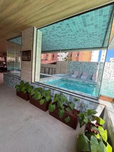 La alberca dentro o cerca de Promenade III 1207, Luxo no Coração da Ponta Verde 45 fotos más