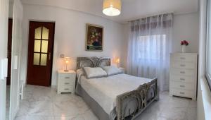 Ένα ή περισσότερα κρεβάτια σε δωμάτιο στο Casa del Parque