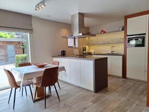 Η κουζίνα ή μικρή κουζίνα στο Au Paradis Guesthouse