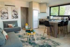 Køkken eller tekøkken på Casa das Oliveirinhas Bungalow by Refúgio ao Luar